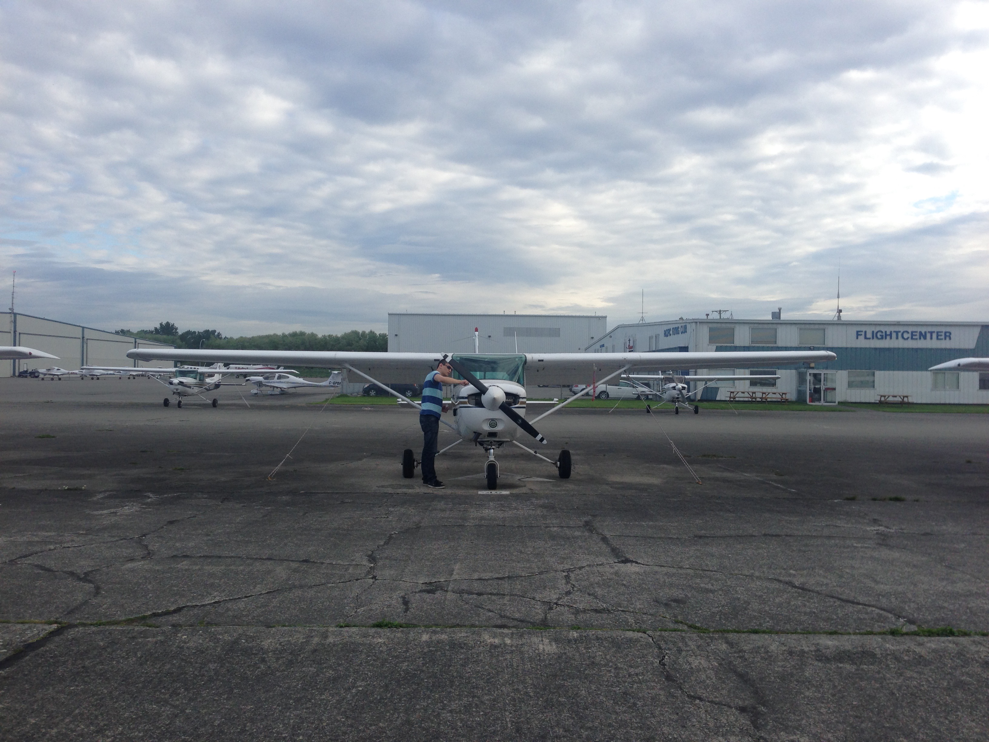 Prepping the plane on a cloudy morning