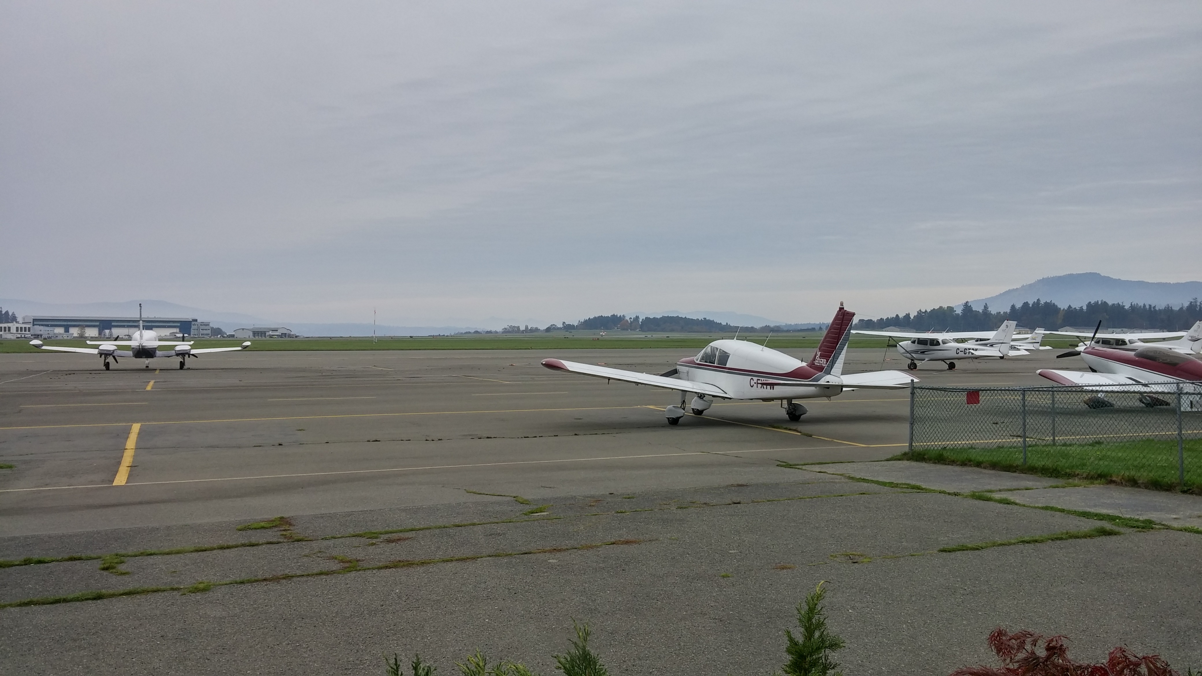 The Cherokee parked in front of the Victoria Flying Club